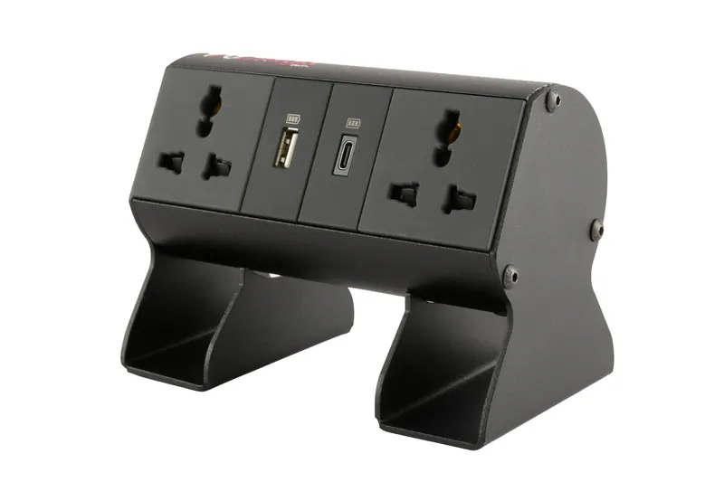 Black desktop power module with two universal sockets and USB charging ports, electrical product photography in Pune
