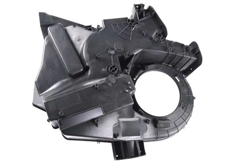 Black plastic blower housing with ribbed internals, industrial component photography in Pune