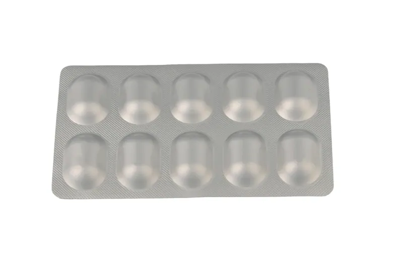 Silver tablet blister pack on a pure white background, pharmaceutical product photography